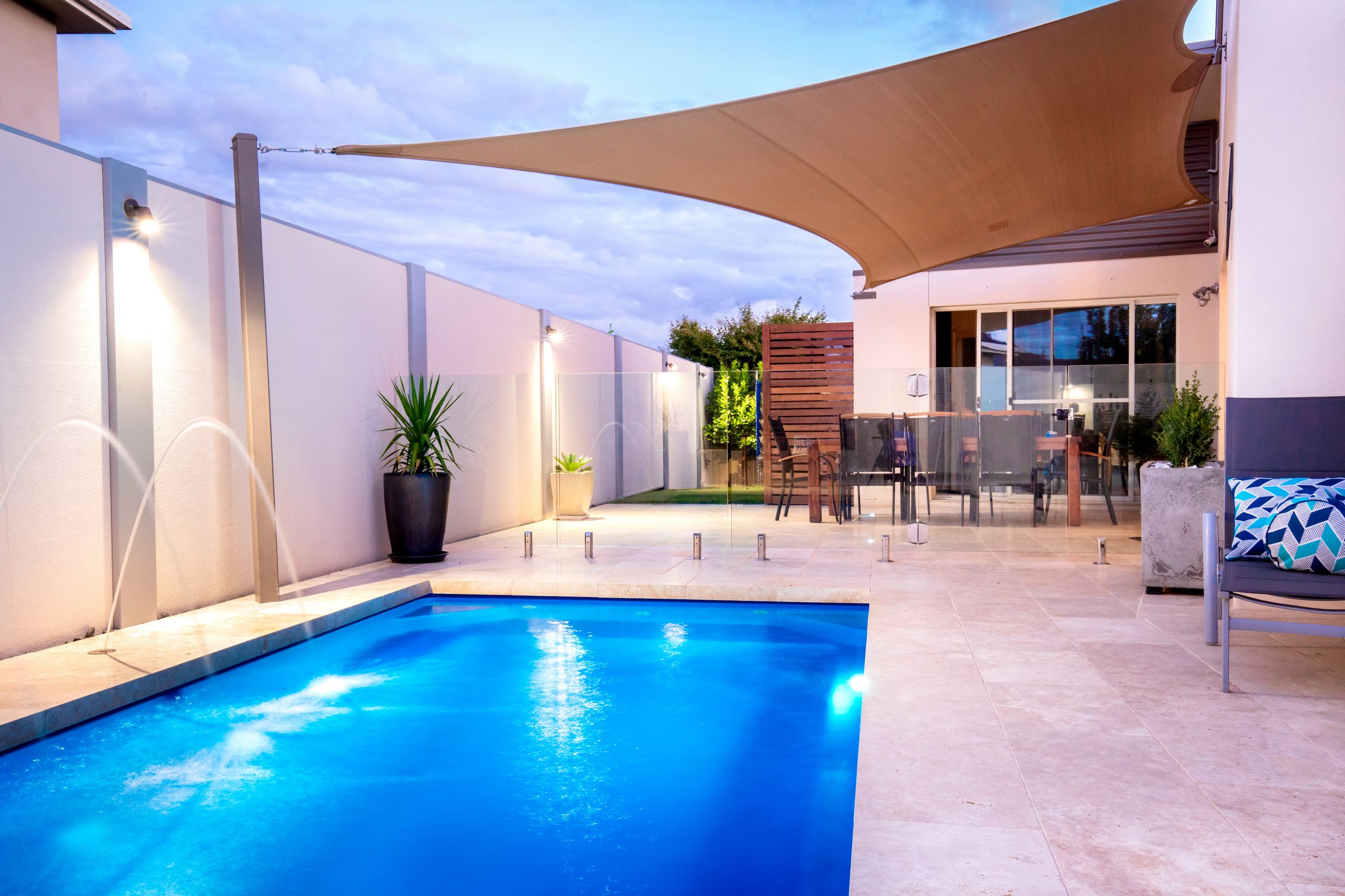Luxury swimming pool in backyard
